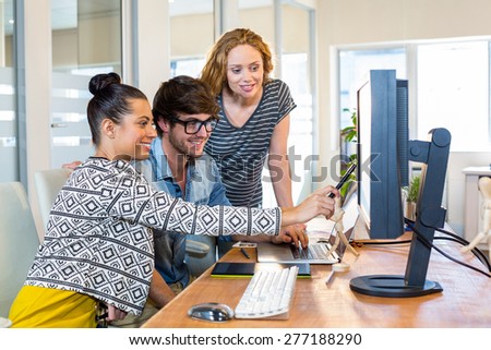 Professional designers working on computer in the office