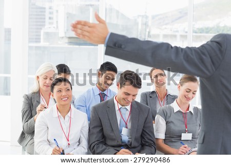 Business people listening during meting in office