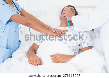 Doctor putting an oxygen mask in the hospital