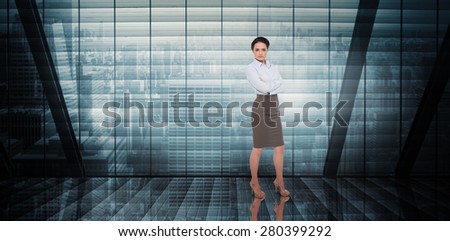 Businesswoman with arms crossed against room with large window looking on city