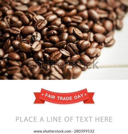 Fair Trade graphic against coffee beans