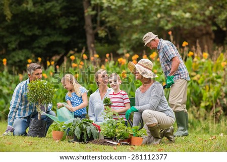Happy family gardening on a sunny day