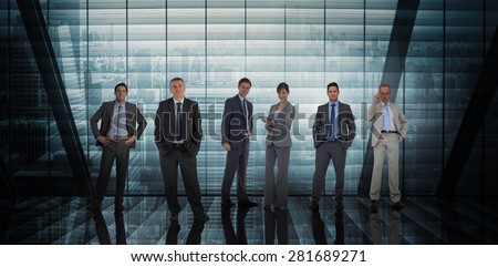 Business people against room with large window looking on city
