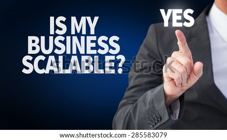 Businessman pointing his finger at camera against blue background with vignette