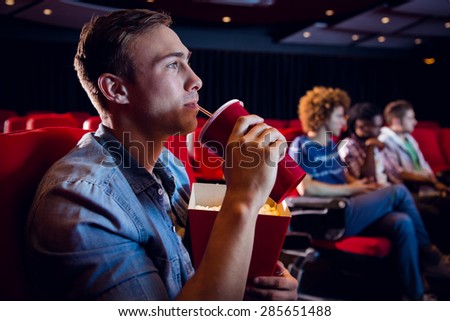 People watching a film at the cinema