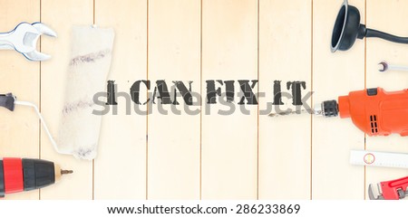 The word i can fix it against diy tools on wooden background