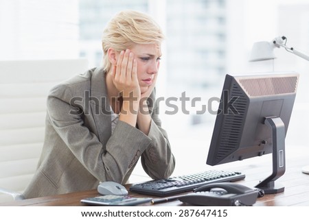 Depressed businesswoman in her office