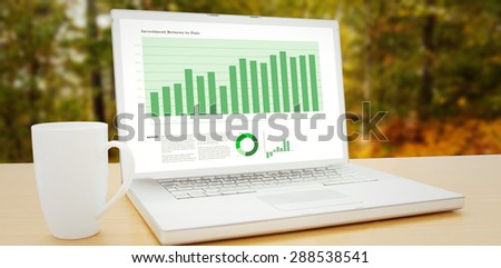 Business interface with graphs and data against scenic view of walkway along lush forest