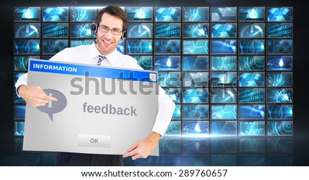 Happy businessman showing card to camera against info box