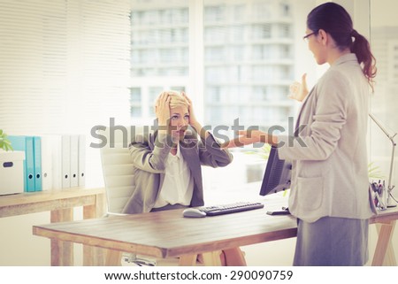 Businesswomen speaking in the office