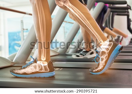 Digital composite of Highlighted bones of man on treadmill
