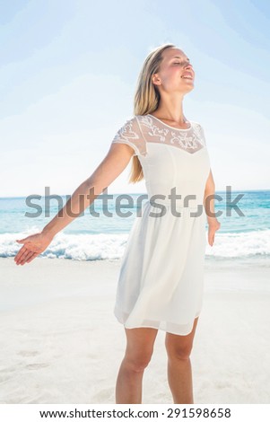 happy woman smiling at the beach