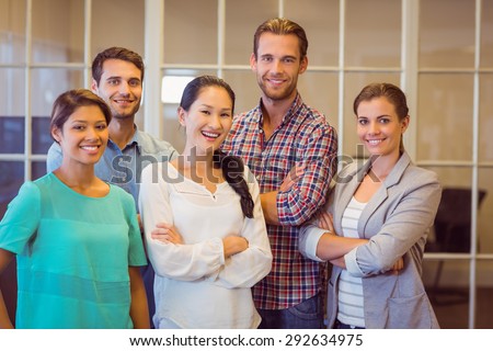 Group portrait of a creative business team posing together