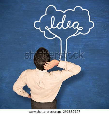 Thinking businessman scratching head against blue chalkboard