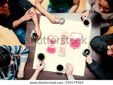People sitting around table drinking coffee against blood donation