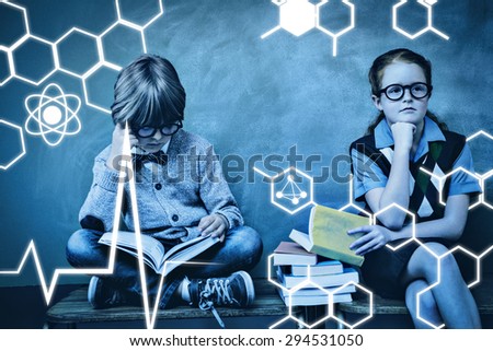 Science graphic against kids with stack of books in classroom