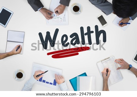 The word wealth against business meeting