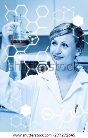 Science graphic against portrait of a bright female scientist looking at an erlenmeyer