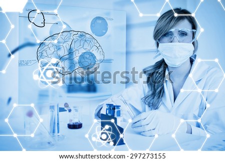 Science graphic against chemist working in protective suit with futuristic interface showing a brain