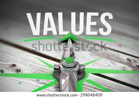The word values and compass against digitally generated grey wooden planks