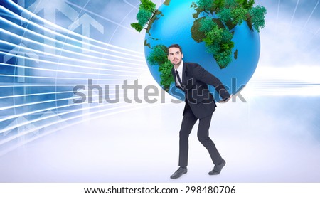 Businessman carrying the world against arrow graphics in blue and white