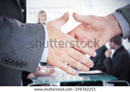 Two people going to shake their hands against businesswoman reporting to sales in a seminar