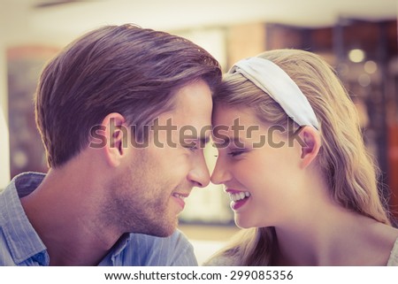 Close up view of a cute couple with joined head