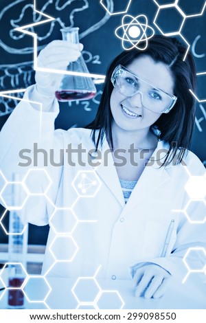 Science graphic against portrait of a cute scientist showing a conical flask