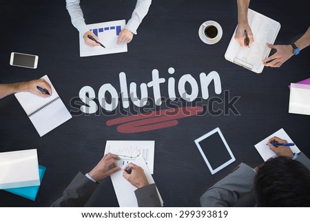The word solution and business meeting against blackboard
