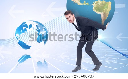 Businessman carrying the world against global business graphic in blue