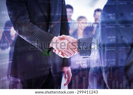 Business people shaking hands against stocks and shares