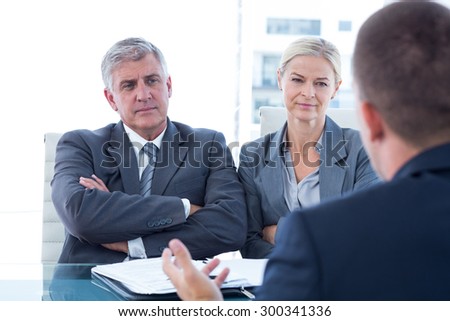 Business people conducting an interview in an office