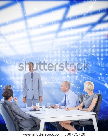 Business people listening during meeting against world map with stocks figures