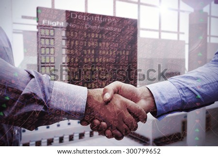 Men shaking hands against stocks and shares