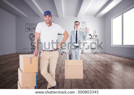 Happy delivery man leaning on trolley of boxes against doodle office in room