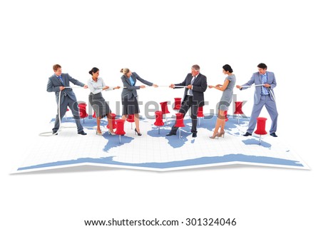 Business team pulling the rope against world map with pointers