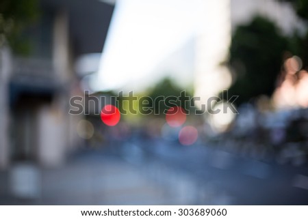 A blurry urban street scene