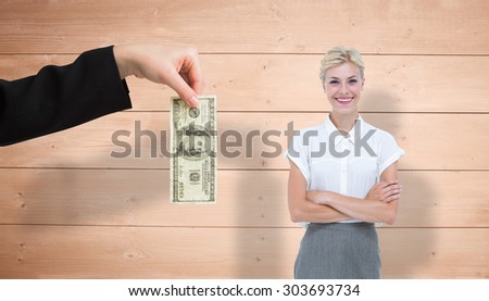 Businesswoman smiling on a white background against overhead of wooden planks
