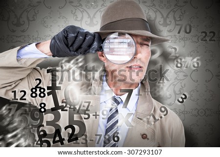 Spy looking through magnifier against elegant patterned wallpaper in grey tones