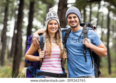 Portrait of a happy hiker couple in the nature