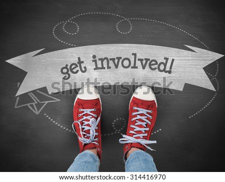 The word get involved! and casual shoes against black background