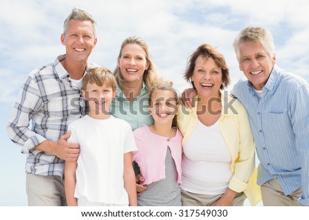 Multi generation family happy and smiling at the beach