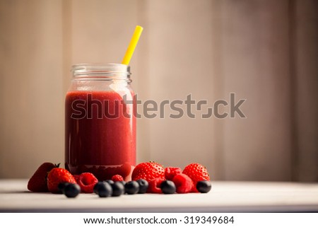 Mixed berry juice jar on the table