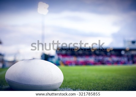 rugby ball against pitch