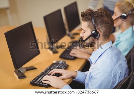 High angle view of businessman working in call center