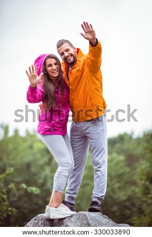 Happy couple on a hike in the countryside