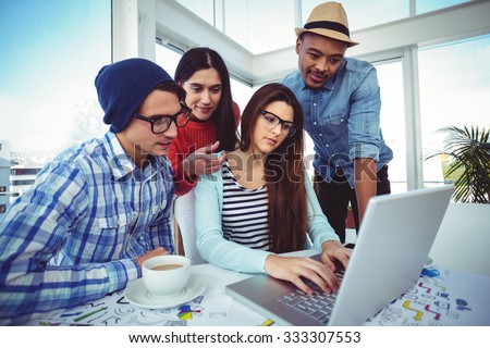 Young creative team having a meeting in casual office