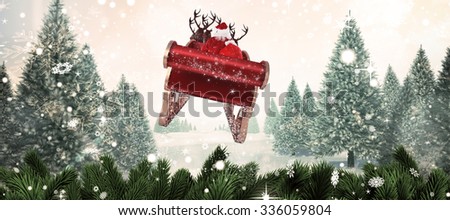 Santa flying his sleigh against christmas scene