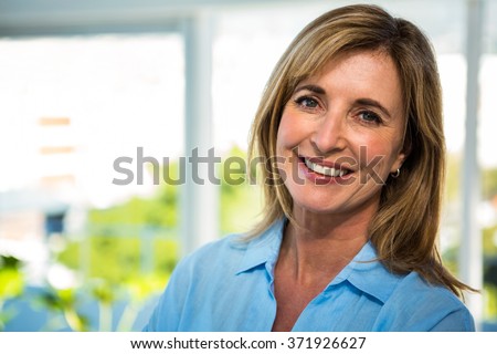 happy woman smiling at the camera
