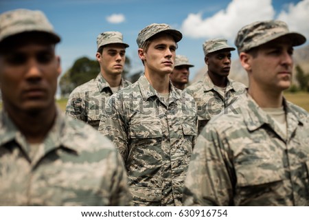 Group of military soldiers standing in boot camp